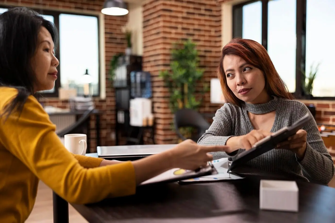 Entrepreneurs conversing about startup ideas